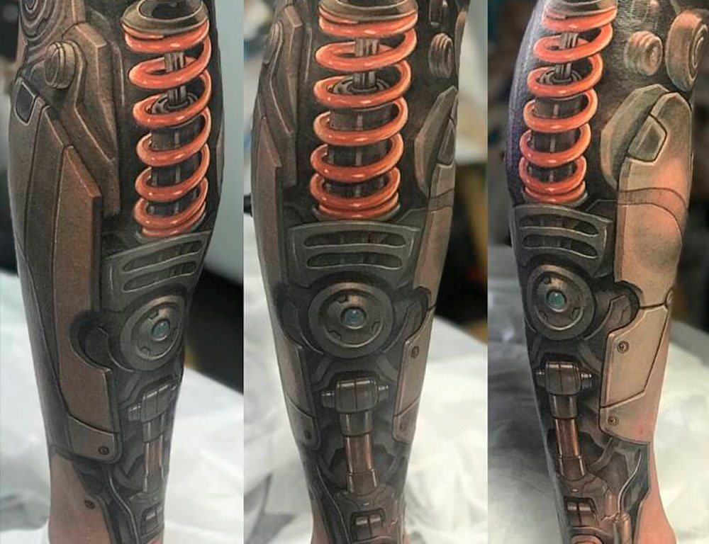 Технологичный фьюжн: как стиль татуировки Биомеханика объединяет механику и биологию в элегантных и инновационных дизайнах.